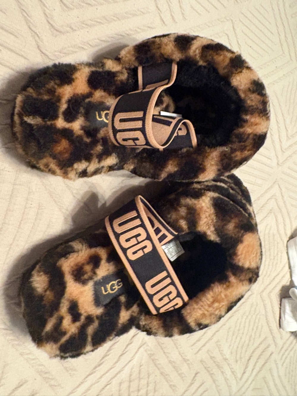 UGG Leopard Faux Fur Slide Slippers in Brown and Black